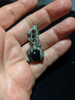 Pewter dragon, castle and black glass orb pendant