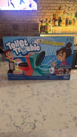 Hasbro Gaming Toilet Trouble Flushdown Kids Game Water Spray Ages 4+ ES. V