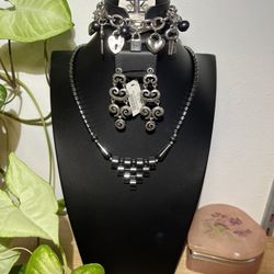 4- piece black and silver jewelry set