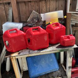4 gas cans three of them are 5 gallon one is a 1 gallon missing the lid spout price is for all