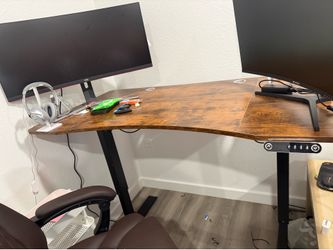 Standing desk 55x30” curved rustic brown. Height adjustable