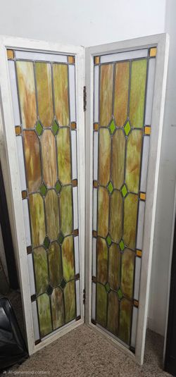 2 stained glass panels about 53 inches tall