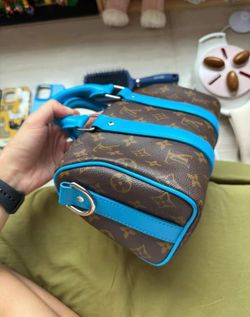 Louis Vuitton messenger bag
