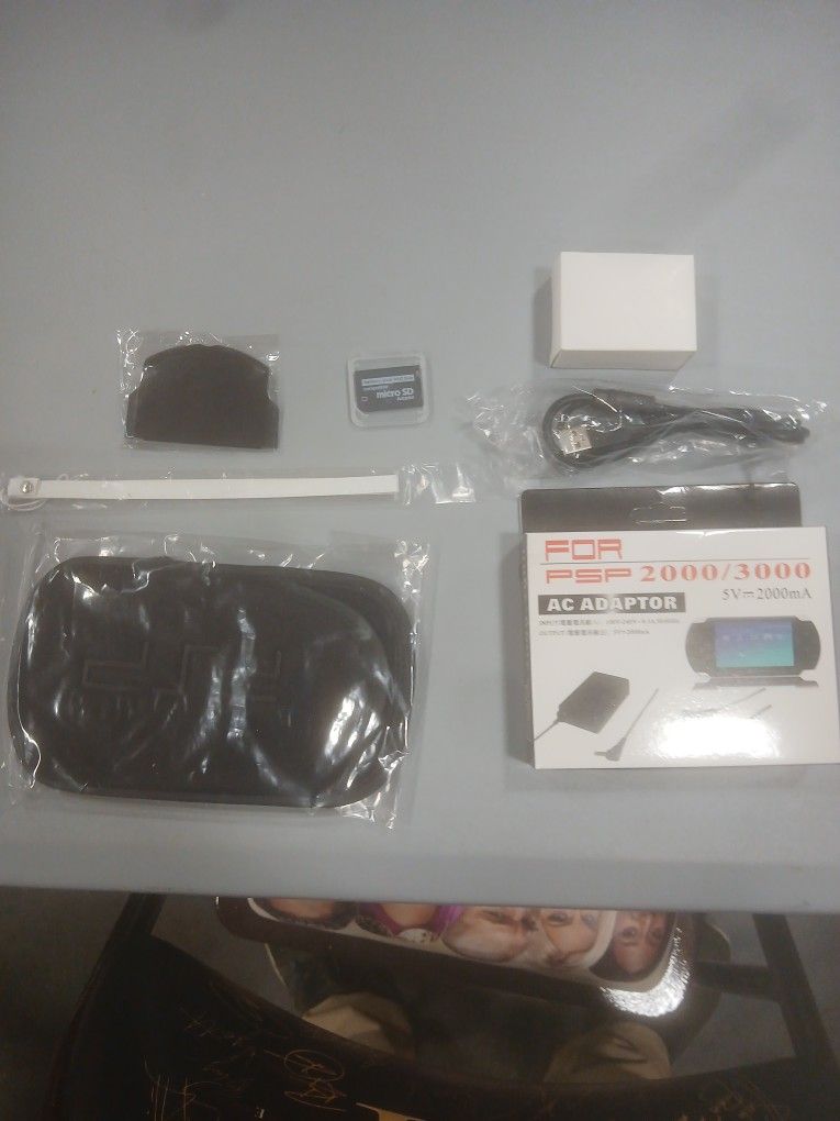 Psp 2000/3000 Ac Adapter And Accessories
