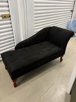Black chaise lounge chair with storage