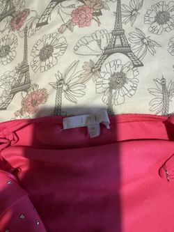 Woman dress with rhinestones on it pink color