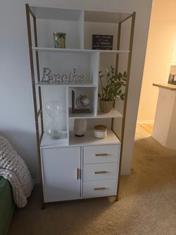 White and gold bookshelf w/storage