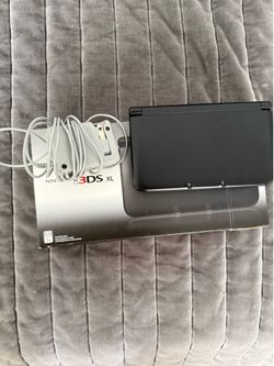 Nintendo 3DS XL with box and charger