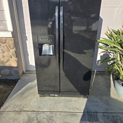 USED refrigerator makes ice