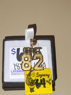 Cash America-18K Gold Pendant