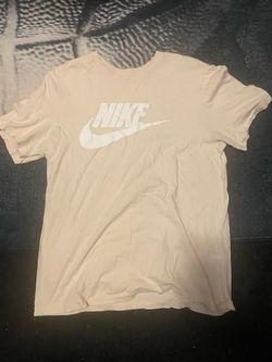 Tan Nike shirt