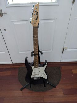 Ibanez Gio Electric Guitar, Amp, Case, Stand And Accessories