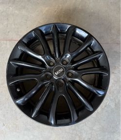 4 used mini rims  ( original ) size 17x 7.5