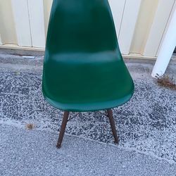 Green Molded Plastic Shell Chair with Wood Dowel Base