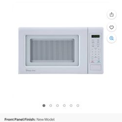 Horno Magic Chef 17.3 in. W, 0.7 cu. ft. Countertop Microwave in Black with 700-Watt Cooking Power