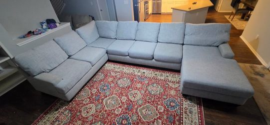 Living Spaces Grey sectional couch
