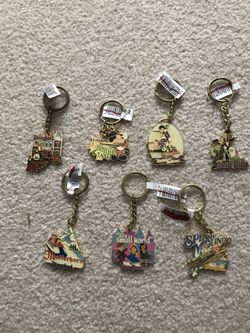 Disney theme park ride attraction keychains. Please read