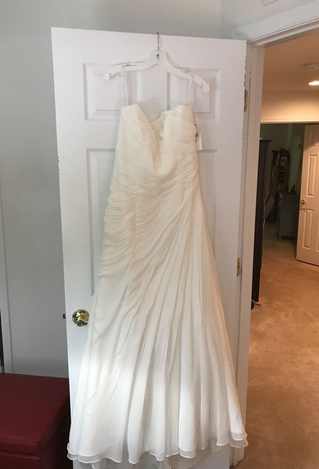 Size 12 never worn chiffon strapless wedding gown
