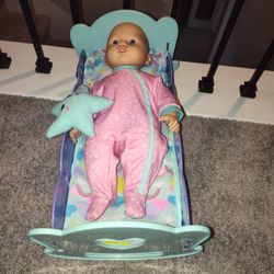 Baby doll and crib