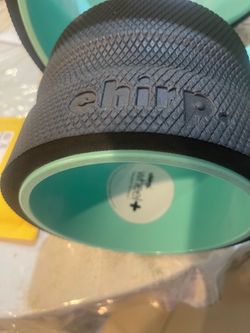 Chirp wheel back roller