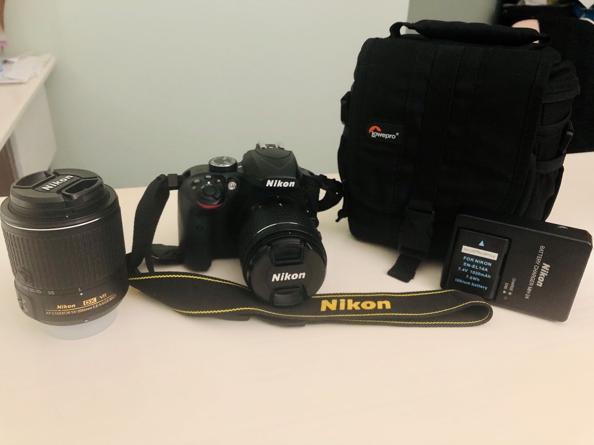 Nikon D3400 DSLR w/ 2 lenses