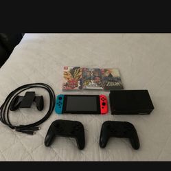  Nintendo switchw Games  Nintendo switch w dock, one wireless pro controller w/ charger and a Joycon controller