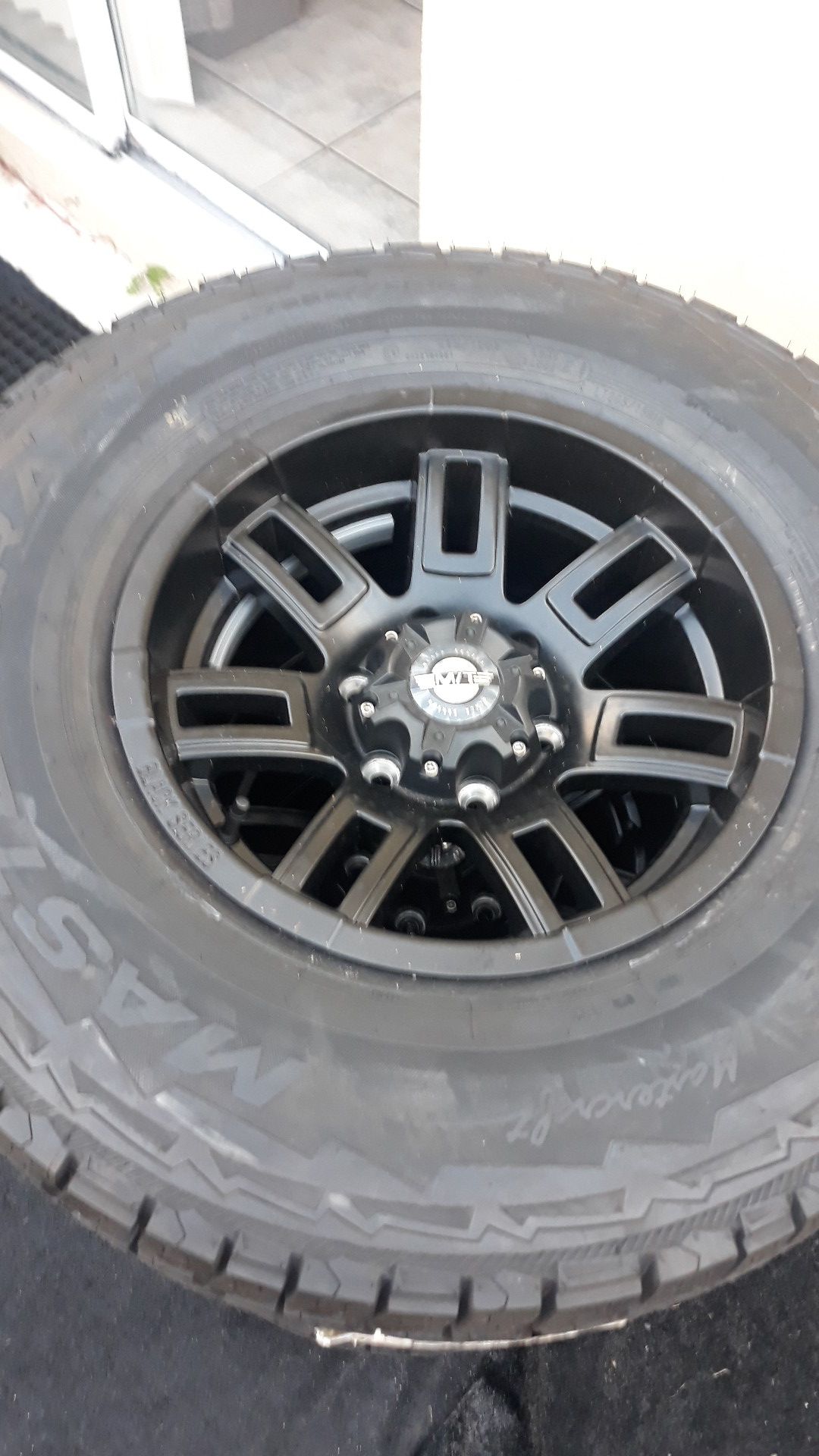 Brand new set of 4 16"x8" Black series rims and mastercraft courser AXT LT265/75/16 tires. 6 lugs