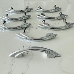 Set of 8 Vintage 50s cabinet door /drawer handle pulls chrome metal MCM Art Deco 4 1/2” long, overall.  2 3/4” inch from screw hole to screw hole.