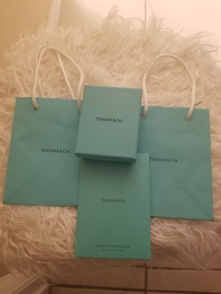 Tiffany bags, boxes and silver polishing cloth