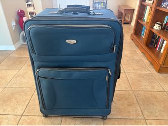 Like New “Protocol” Checked Luggage With Spinner Wheels