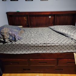 TWIN TRUNDLE BED BOOKCASE & THREE DRAWERS W/ TWO TWIN MATTRESS