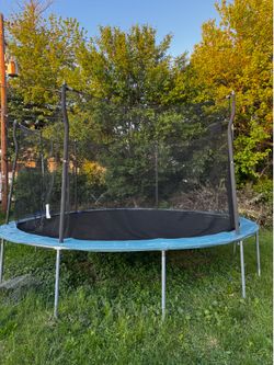 Propel 15’ trampoline with enclosure and basketball hoop