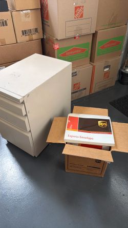 FREE small file cabinet (no key) 25"H x 15"W x  23"D Plus 225 UPS Express Envelopes
