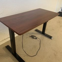 Adjusting Electrical Desk