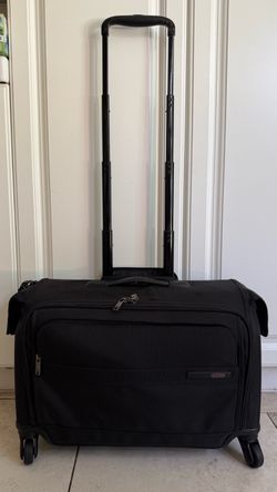 Tumi Alpha 4-Wheel Garment Carry-On Bag New Without Tag, Wheel Never Roll On, A Few Minor Scratches Due To Storage. Absolutely No Issues!!! Pickup in