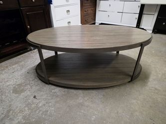 Gray Rustic Oval Coffee Table on Wheels