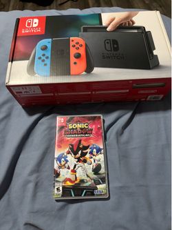 Nintendo switch in box like new with + sonic shadow generations