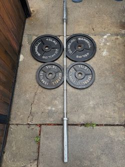 Olympic weights with olympic bar with pair 45lbs and 35lbs