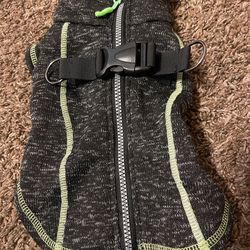 Small black with green dog sweater with built in harness