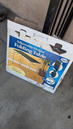 Adjustable Height Folding Table