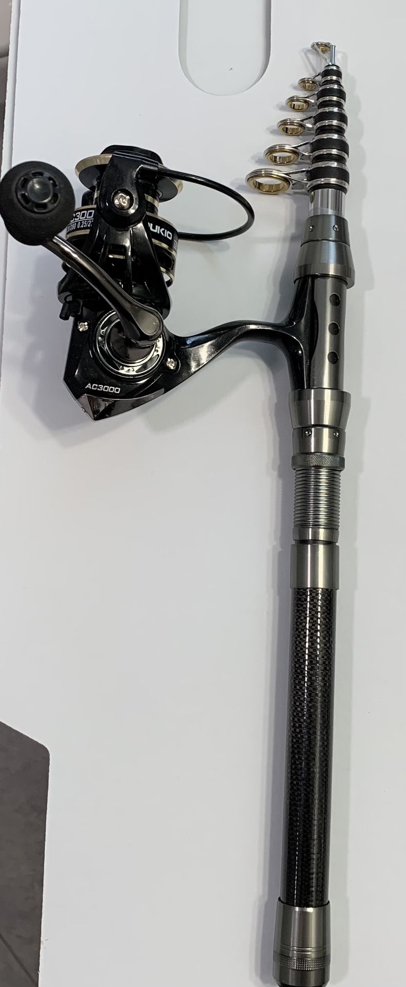 Spinning Reel / Rod Combo. New Collapsable Carbon Fiber Fisher Pole. 
