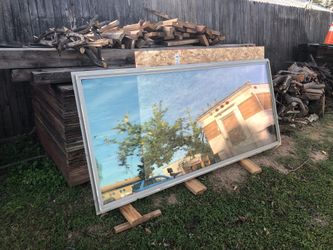 Used window plate glass no slider. Fits opening 42 1/2 x 96 1/2 rough opening. 366 low E film, with Would look window covering white wash