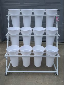 For Sale- indoor/outdoor flower stand. Add Fresh flowers  to 12 container containers.