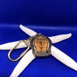 Alaska Butt Ugly Gold Tone Keychain 