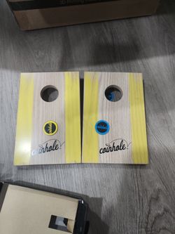 Coin hole game