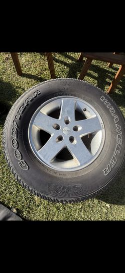 Jeep Rim Tire No Good But Holds Air