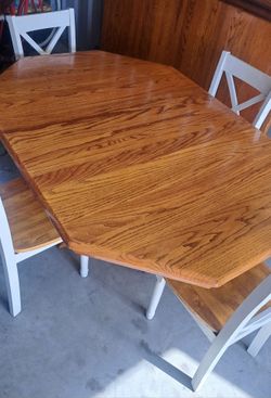 Dining table solid wood with 4 chairs - has leaf
