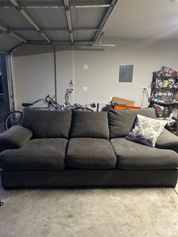 Dark grey three seat sofa