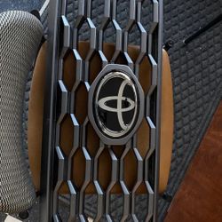 Toyota Tacoma OEM Grill with Emblem 2016-2021