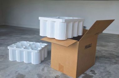 Seven wine crates holding 12 bottles each.